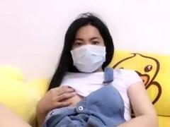 Thai camgirl with cute tits masturbates on camera