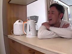 Japanese guy gets to fuck the cute Japanese girl in his kitchen