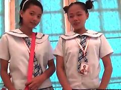 Two Asian Amateur Cuties Sharing A White Dick